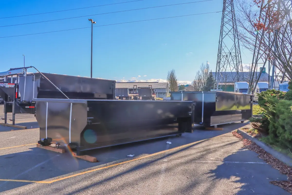 Roll-off dumpster ready for waste disposal at job site for Commercial Dumpster Rental in Larose